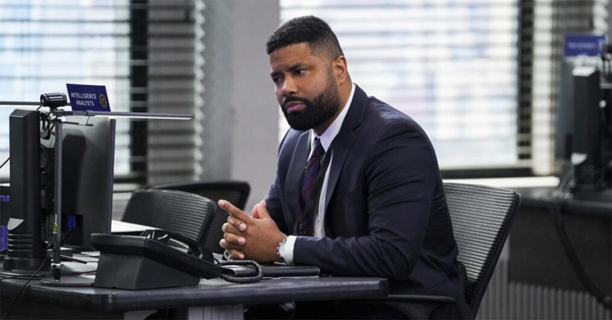 Hobbs in a suit behind a desk on 'FBI.' 