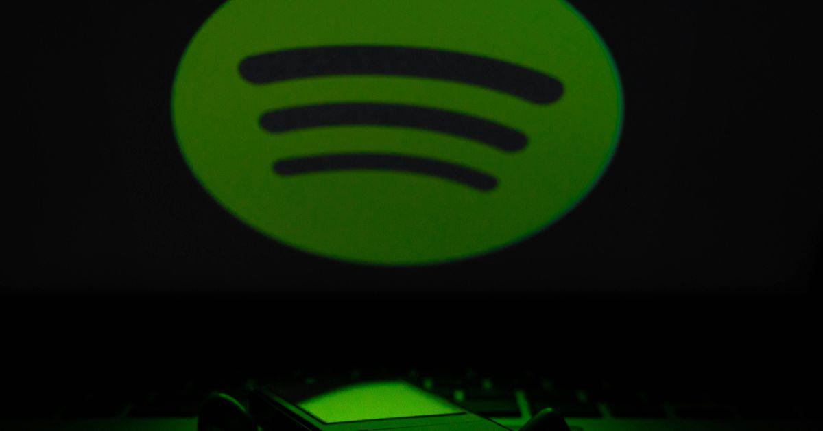 Spotify music logo over a media player