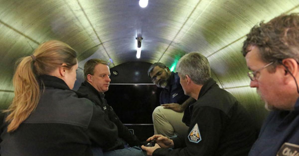 This photo, which is from a past expedition, shows what the inside of the Titan submersible looks like, which only has the capacity to fit five people.