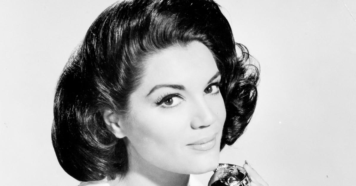 Connie Francis holding a trophy