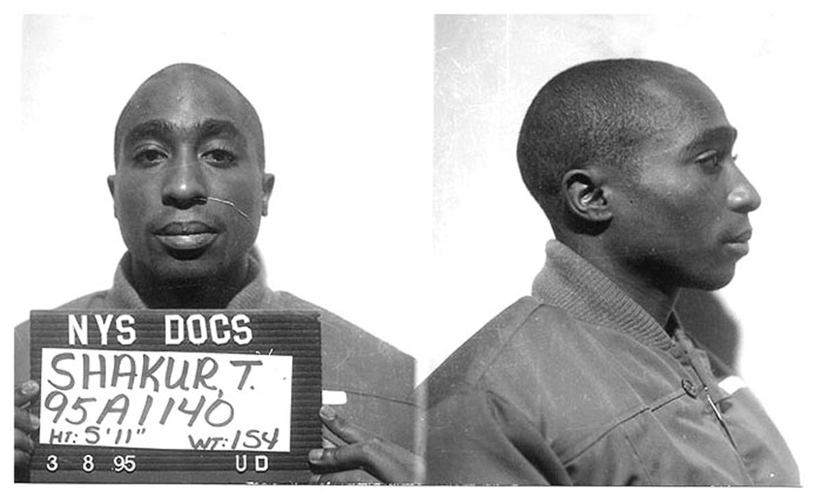 Tupac Shakur's NY mugshot in black and white.