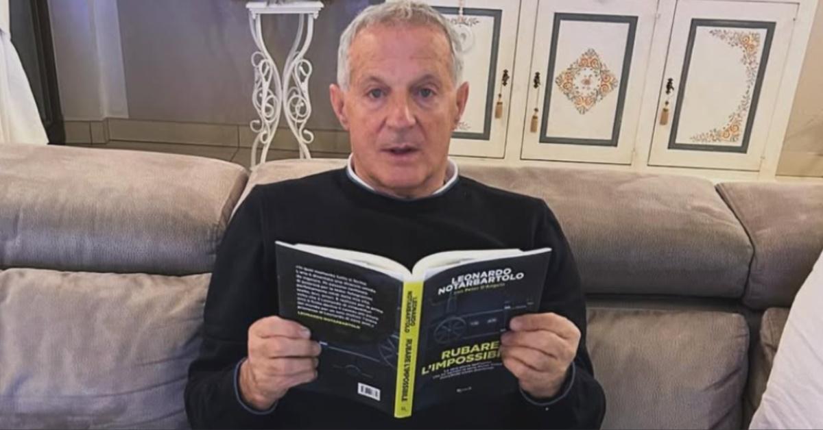 Leonardo Notarbartolo reads a copy of his book, "Rubare l'impossibile."