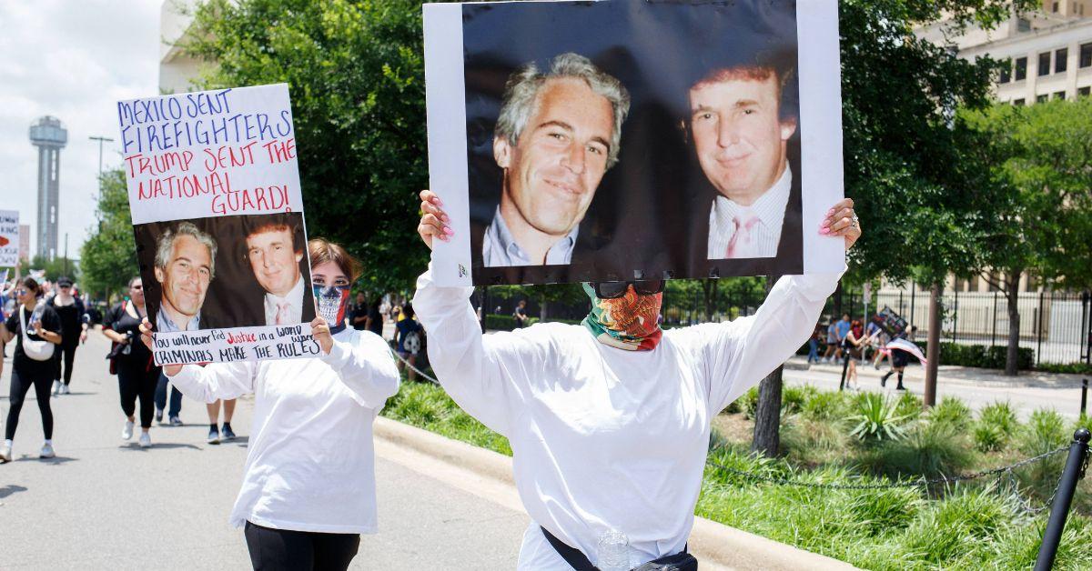 A protester holding Donald Trump and Jeffrey Epstein. https://www.distractify.com/p/jeffrey-epstein-religion