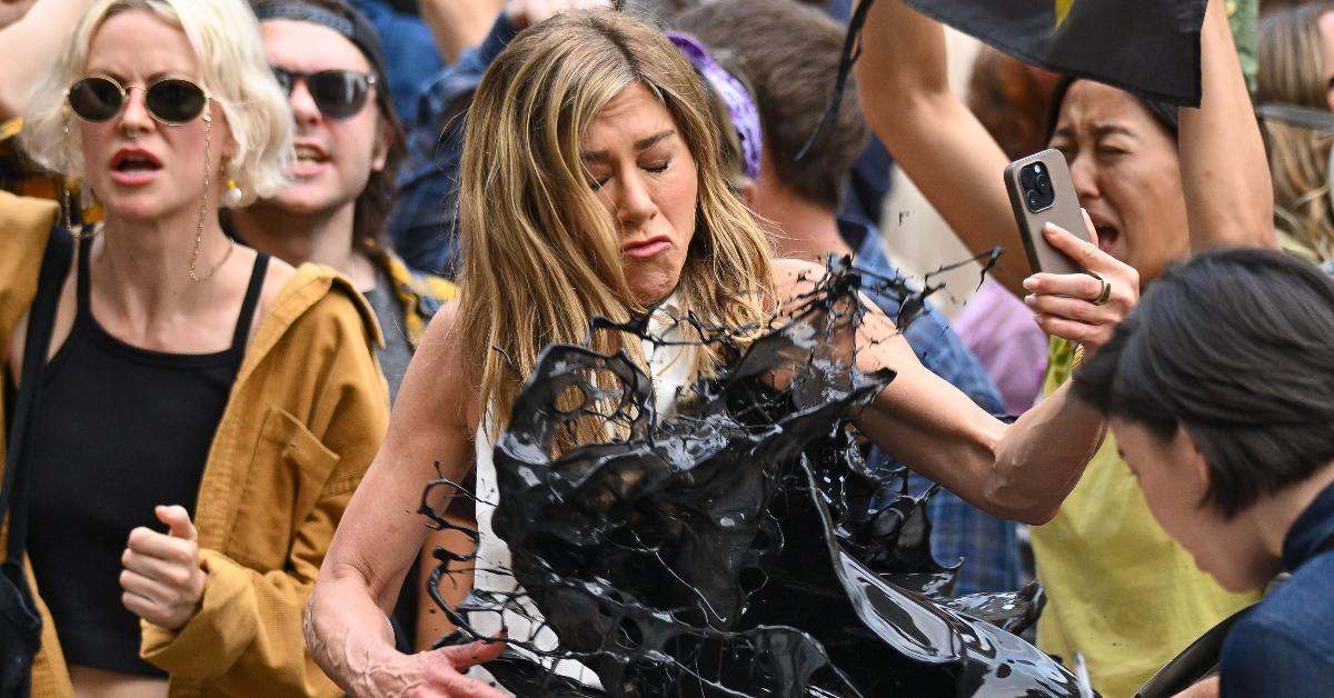 Jennifer Aniston gets oil thrown on her during climate change protest scene for Apple TV Plus's The Morning Show, in character as Alex Levy