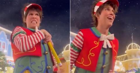 Tally the Elf interacting with a guest.