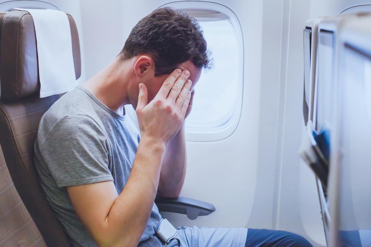 women stop creepy man on airplane