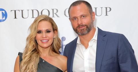 Jackie and Evan Goldschneider pose for photo at an event