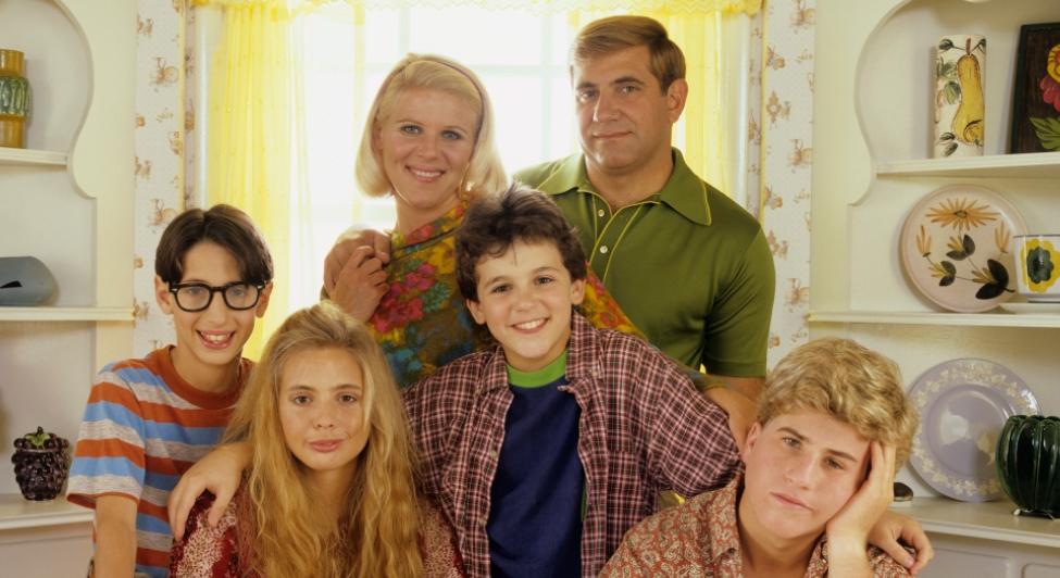 Fred Savage, Olivia d'Abo, Jason Hervey, Dan Lauria, Alley Mills, and Josh Saviano in 'The Wonder Years'