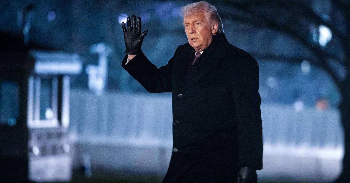 Donald Trump greets reporters on the South Lawn of the White House.