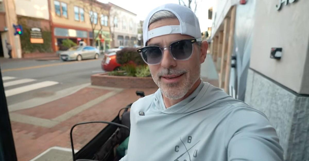 'Beast Games' Season 1 winner, Jeff Allen, walking with his son.