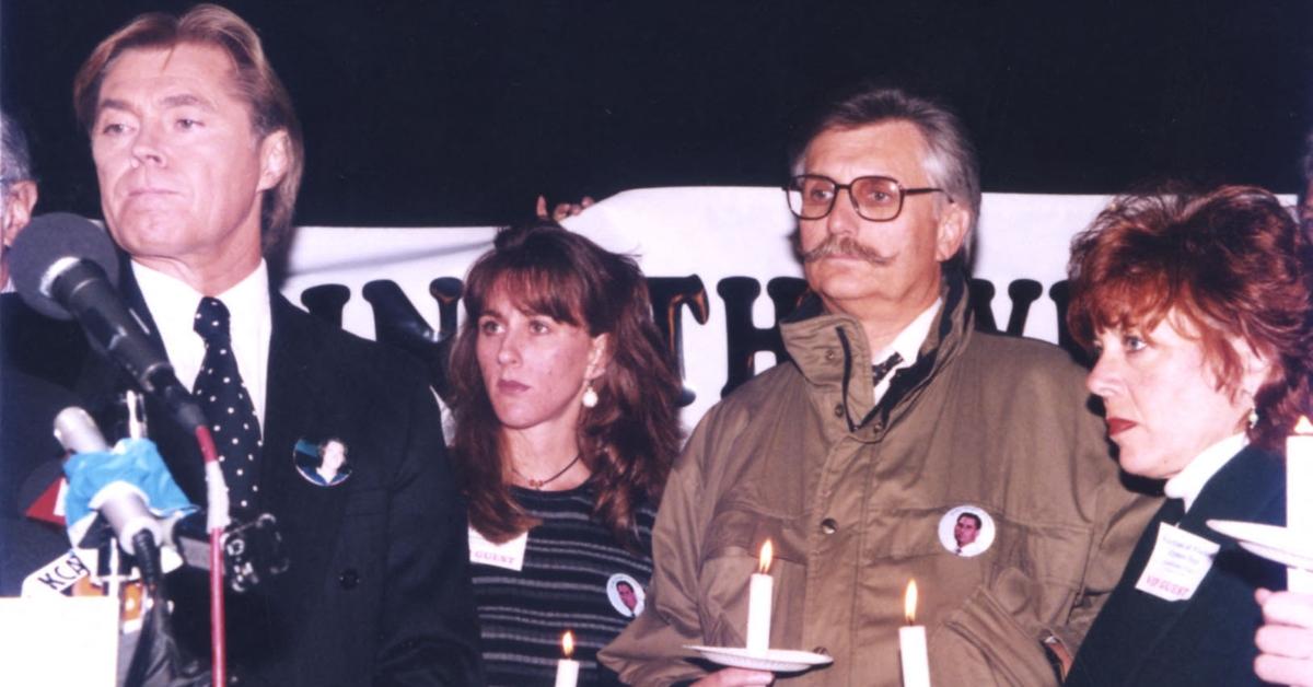 Kim Goldman (C) and her father (R) at a vigil for Ron Goldman