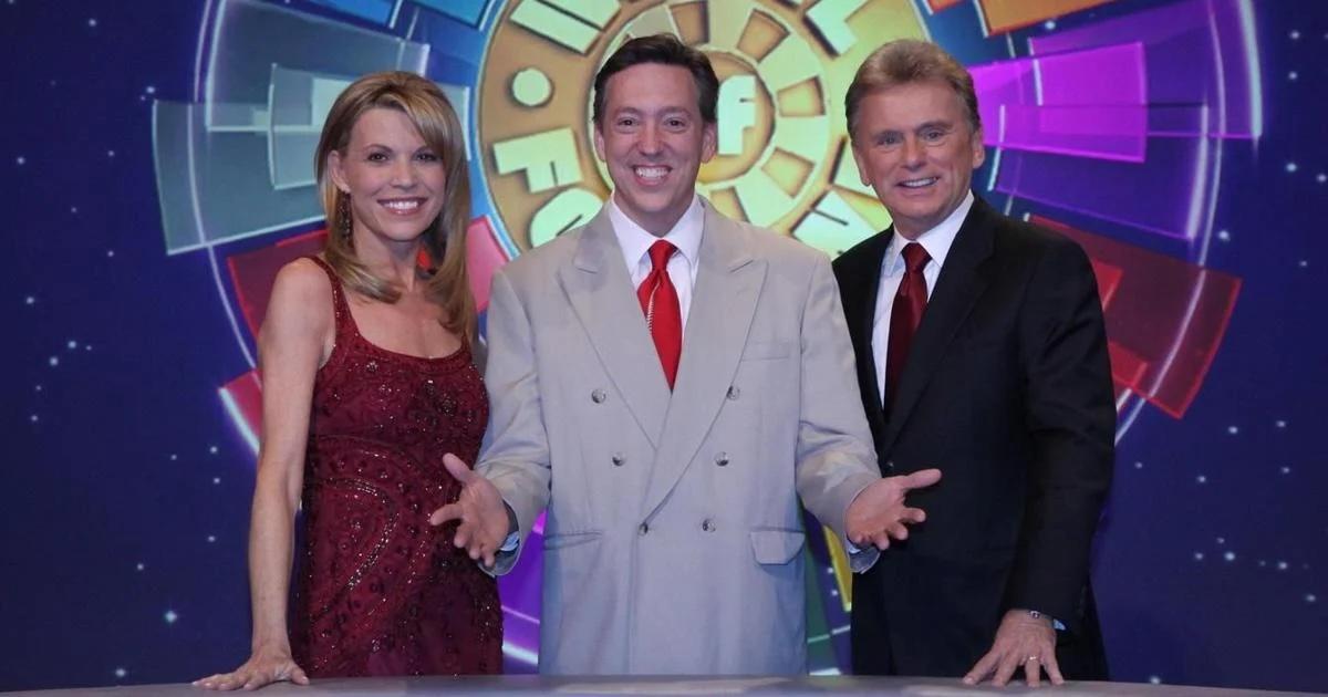 Vanna White, Jim Thornton, and Pat Sajak pose with Wheel of Fortune