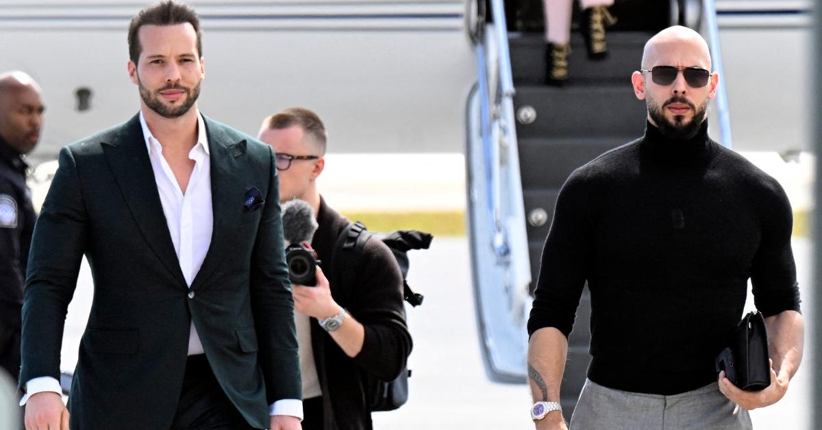 Andrew Tate (R) and Tristan Tate (L) arrive in Florida