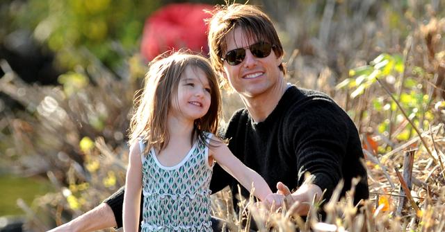 Tom Cruise and his daughter, Suri, visit Charles River Basin on Oct. 10, 2009, in Cambridge, Mass.