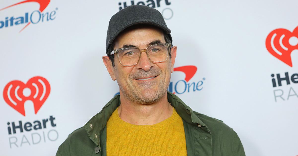 Ty Burrell wearing a hat and green jacket at an iHeart Radio event in 2020. 