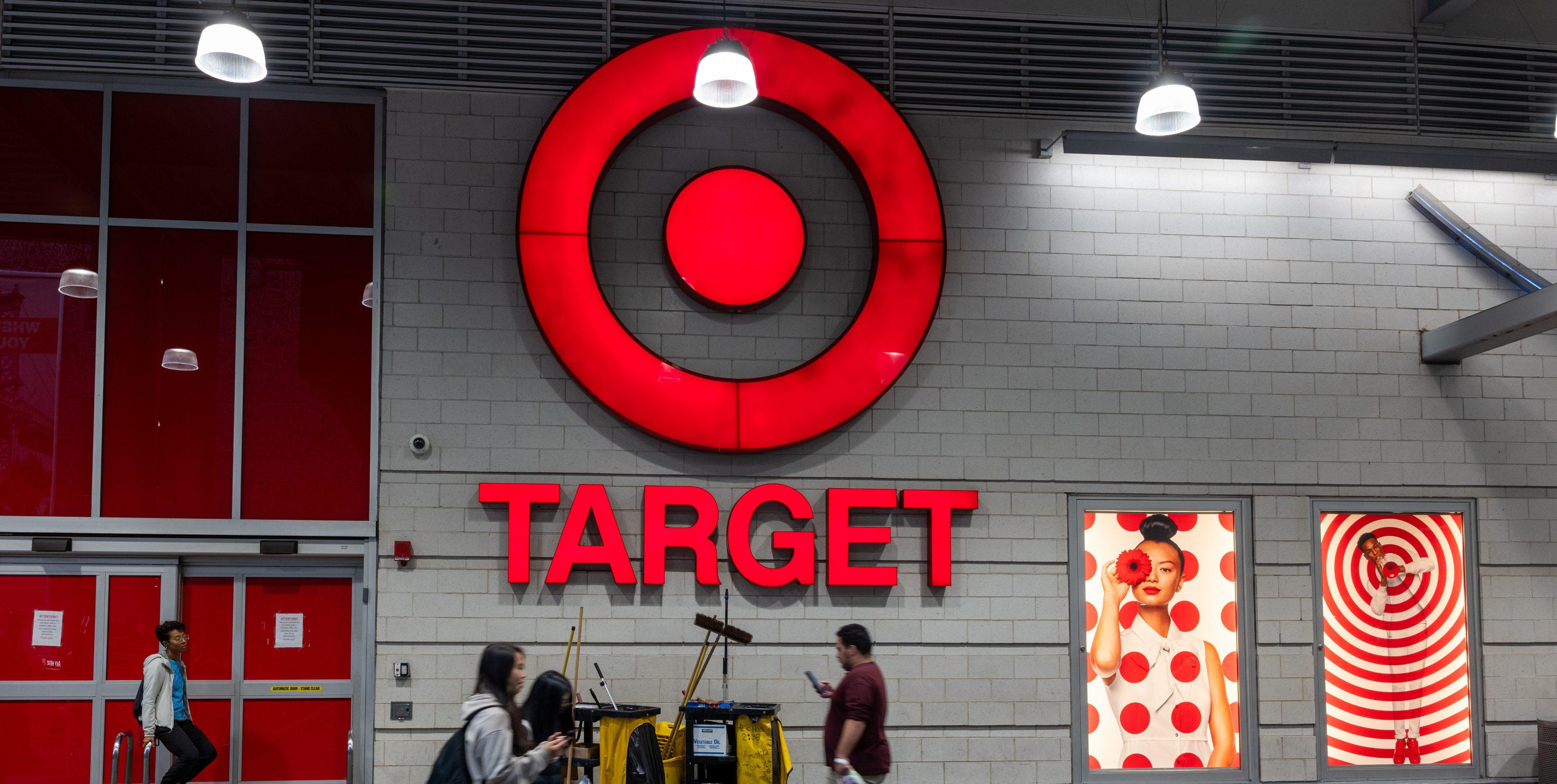  People walk by a Target store in the Harlem neighborhood in Manhattan