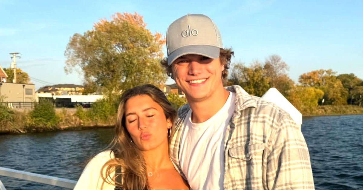 Katya Kuropas and J.J. McCarthy posed by the water. 