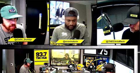 The crew of 93.7 morning show recording together.