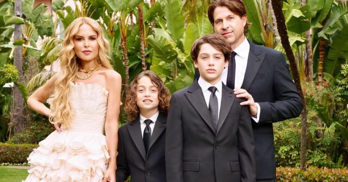 Rachel Zoe, Rodger Berman, and their two sons stand outside together