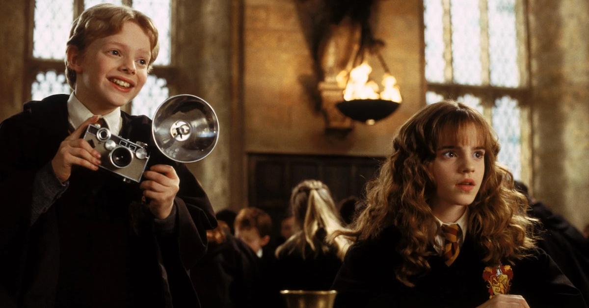 Colin Creevey with his camera next to Hermione in 'Chamber of Secrets'