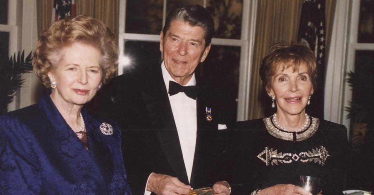 President Ronald Regan (C) with First Lady Nancy Reagan (R) and British Prime Minister Margaret Thatcher (L)