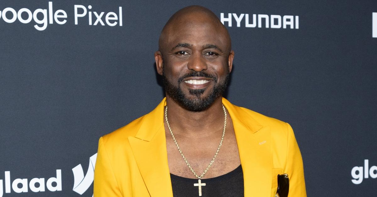 Wayne Brady in yellow suit and wearing cross necklace attends the 35th Annual GLAAD Media Awards at The Beverly Hilton on March 14, 2024 in Beverly Hills, California. (Photo by Steven Simione/WireImage)