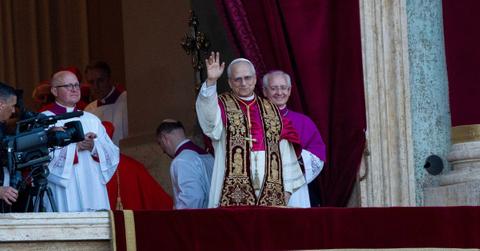 Pope Leo XIV greeting a crowd at the Vatican.