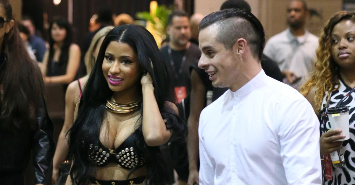 Rapper Nicki Minaj (L) and choreographer Casper Smart attend the 2014 iHeartRadio Music Festival at the MGM Grand Garden Arena on September 19, 2014 in Las Vegas, Nevada.