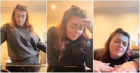 This woman child locks her dinner in the oven and can't get it open.