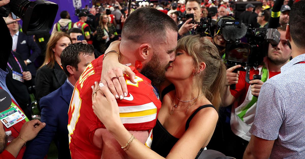 Travis Kelce kissing Taylor Swift after the Super Bowl. 