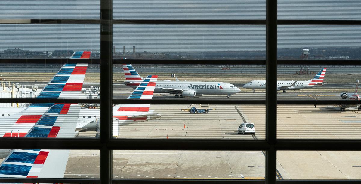 American Airlines planes sit at Ronald Reagan Washington National Airport in Arlington, Virginia, on Jan. 18, 2022