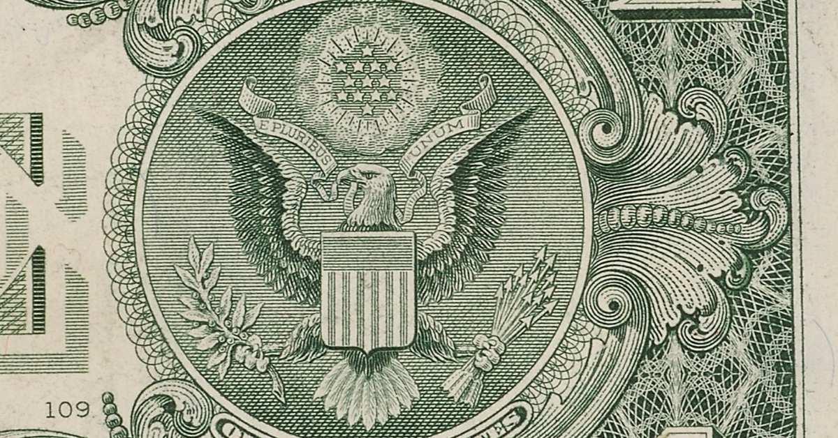 The seal of America on the back of the one dollar bill