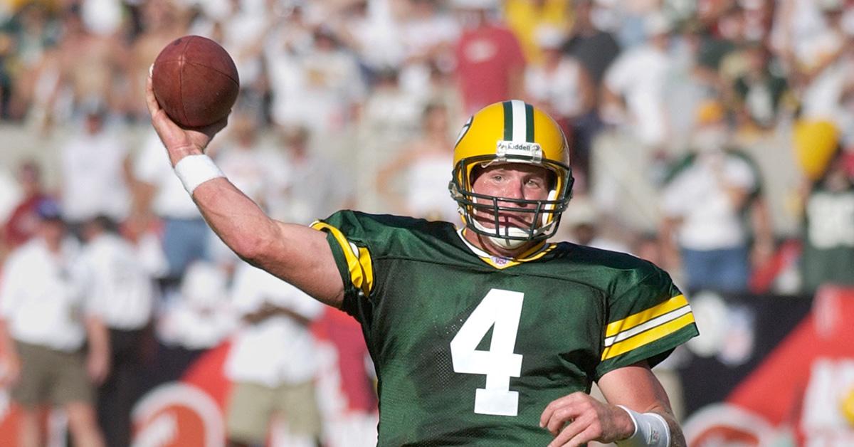 Brett Favre throwing the football in a Green Bay Packers uniform. 