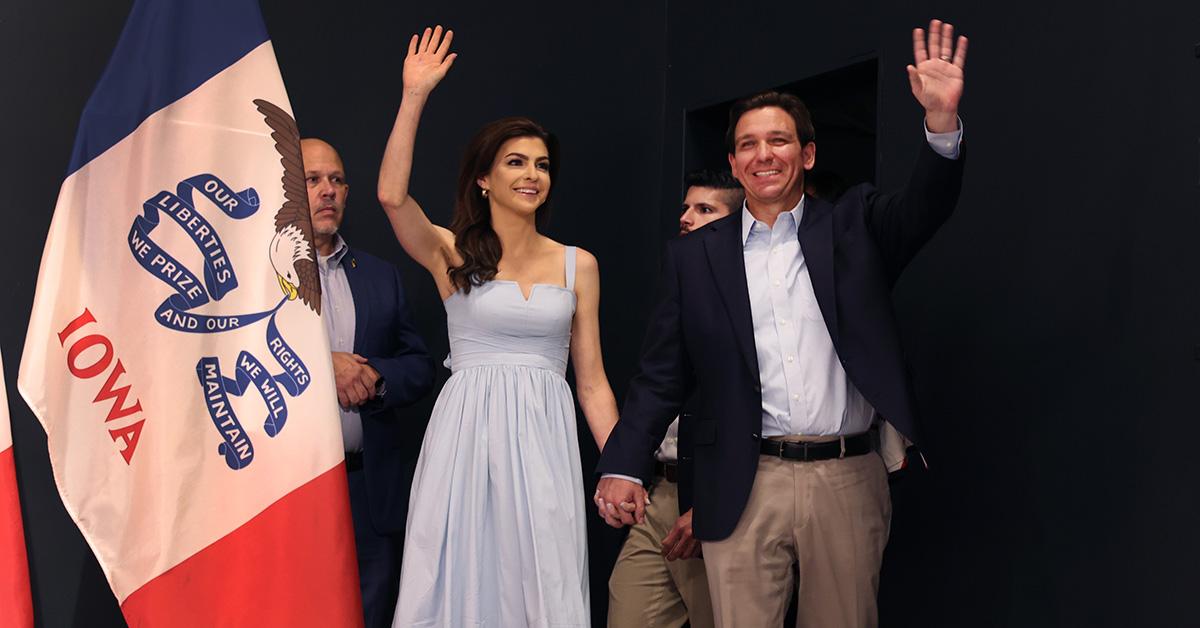 Ron and Casey DeSantis waving in Iowa. 