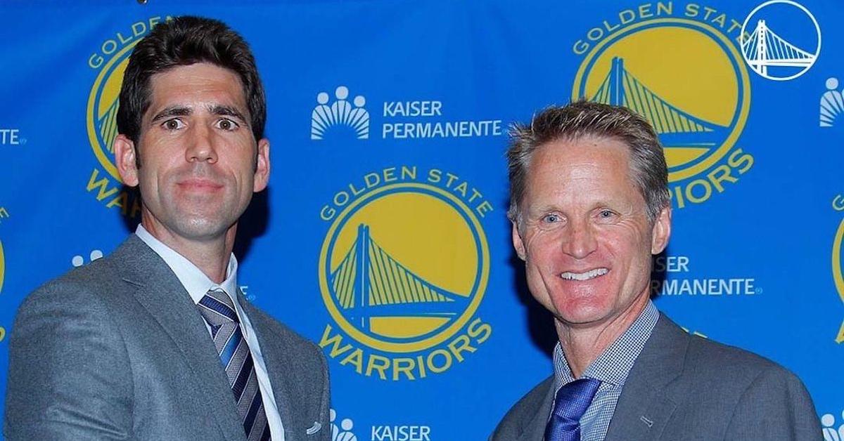 Bob Myers and Steve Kerr posing at a press event