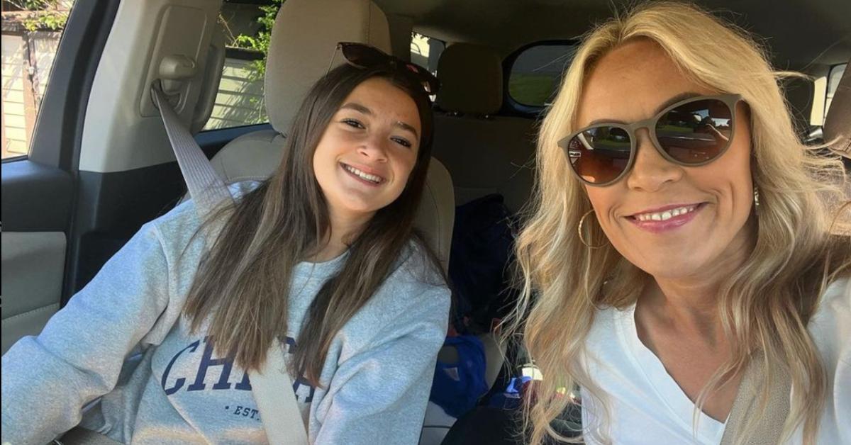 Ava Wood and her mother Heather Wood smile in a car together