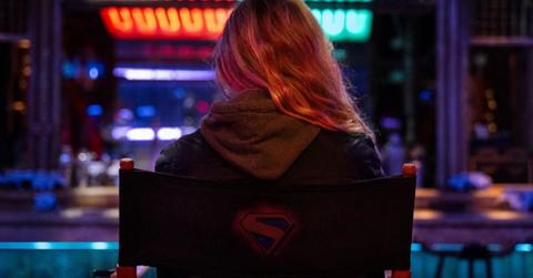 Milly Alcock as Supergirl from behind.