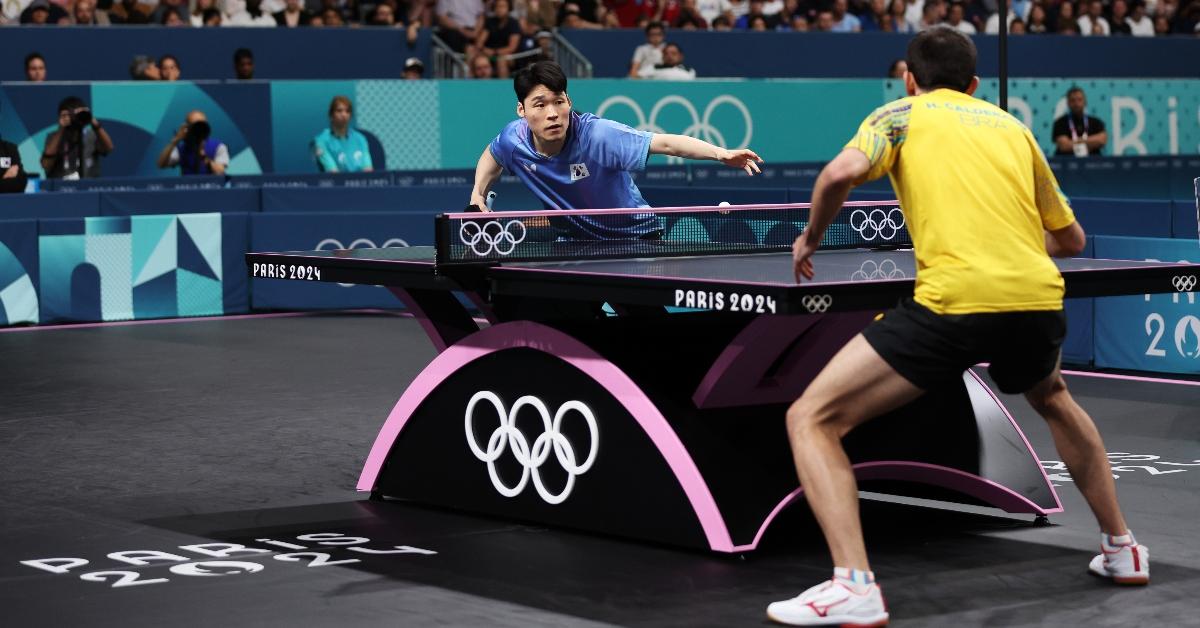 A general view as Won Jin Kim of Team South Korea and Hugo Calderano of Team Brazil compete during the Men's Singles Quarterfinal match between Won Jin Kim of Team South Korea and Hugo Calderano of Team Brazil on day six of the Olympic Games Paris 2024 at South Paris Arena on August 01, 2024 in Paris, France. (Photo by Lars Baron/Getty Images)