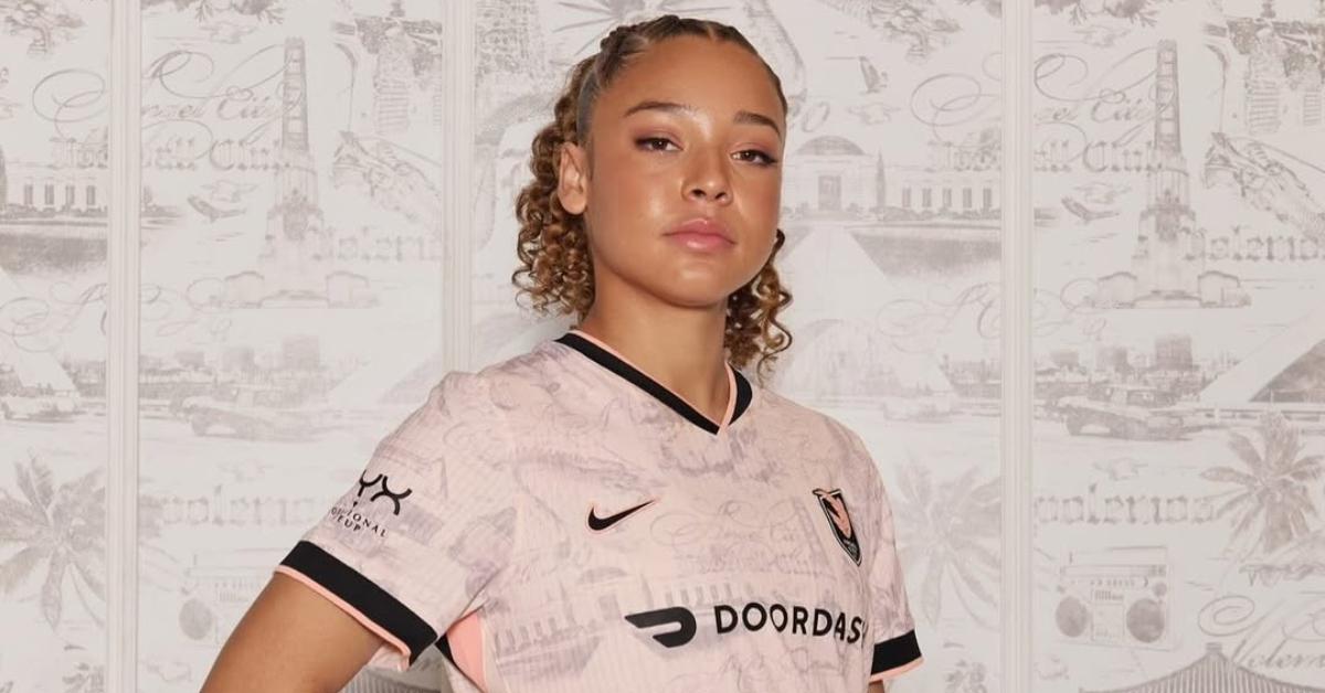 Savy King poses in her soccer uniform