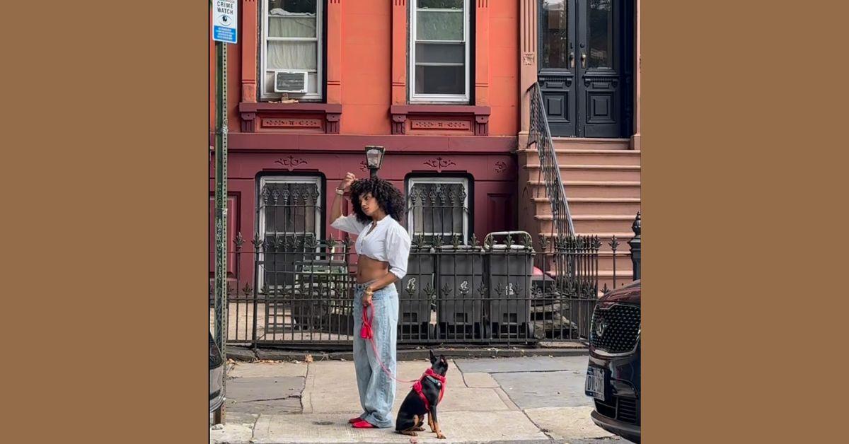 Jade Delgado poses for a photo with Ziggi on the streets of NYC.