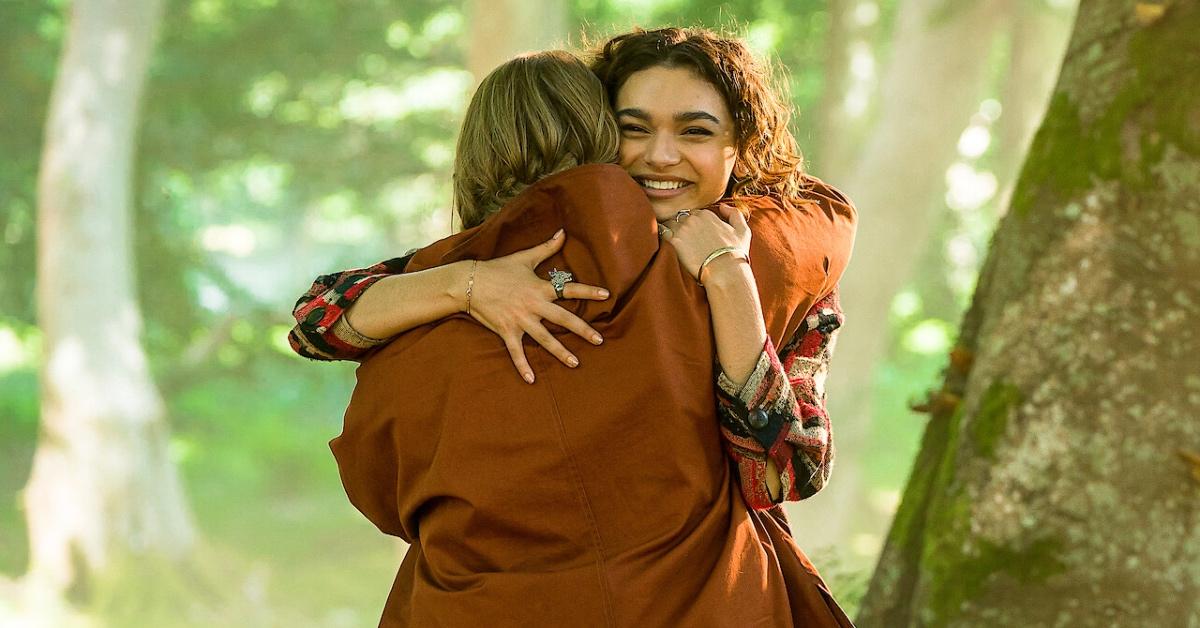 Terra (Elliot Salt) hugs Flora (Paulina Chávez).