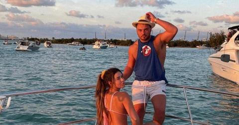 Brielle and Ethan on a boar