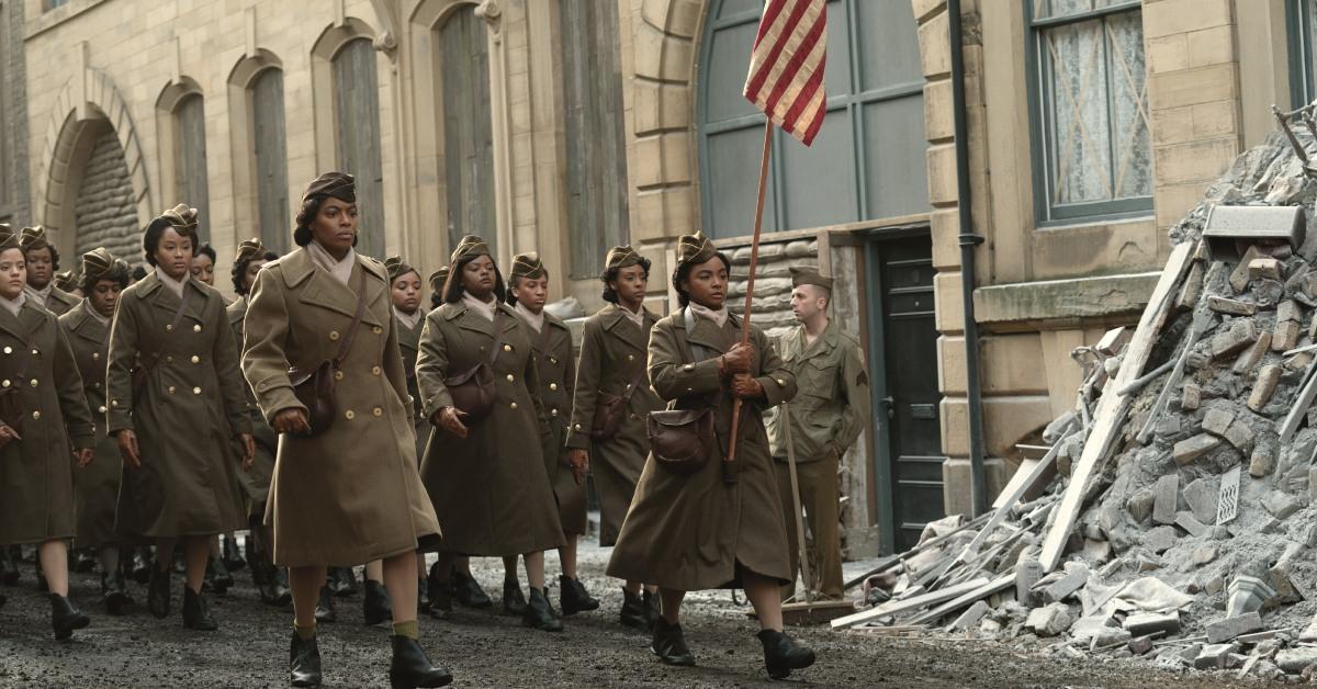 Members of the 6888 Battalion marching down the street in the Netflix film 'The Six Triple Eight'