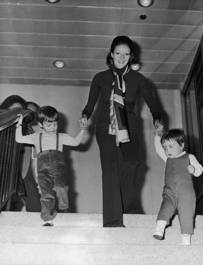 Maggie Smith with her two children, Chris Larkin (left) and Toby Stephens, at London Airport, March 1971