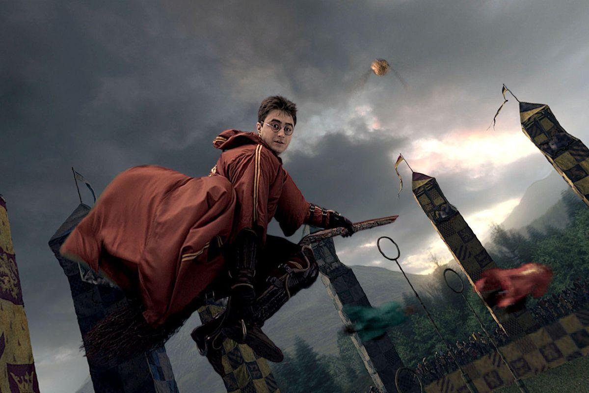 Daniel Radcliffe as Harry Potter playing Quidditch