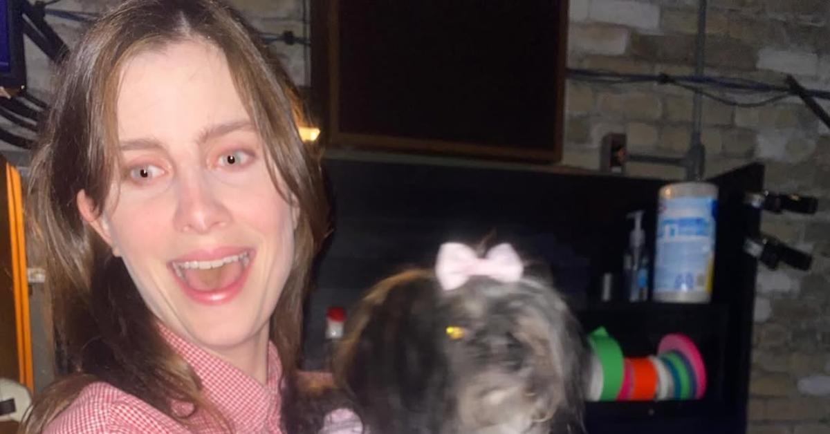 Vic Michaelis holding their dog