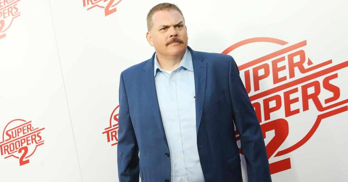 Kevin Heffernan raising his eyebrow on the Super Troopers 2 red carpet