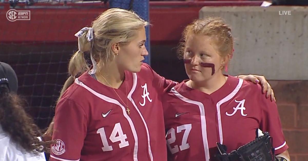 Montana Fouts encouraging Alex Salter between innings on the Alabama-Arkansas game on May 10, 2023.