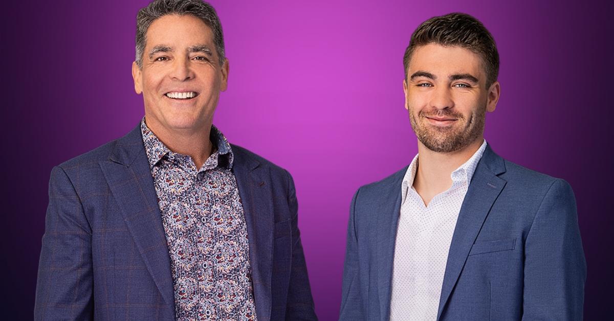 Darren and Sam from MILF Manor in front of a purple background