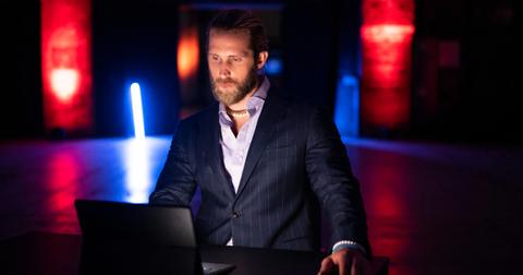 Will Richardson wears a suit while taking the final quiz in the Season 1 finale of Netflix's 'The Mole.'